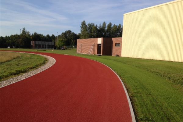 Aanleg kunststof atletiekpiste in vol PU - Sportinfrabouw NV